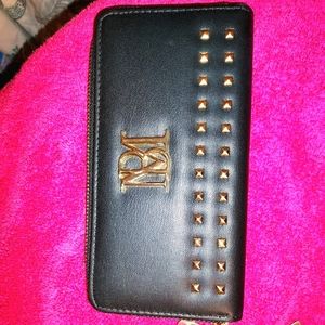 A brand new black wallet, brand is Bagley Mischka